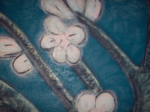 pink and white flowers painted on branches and blue almond blossom