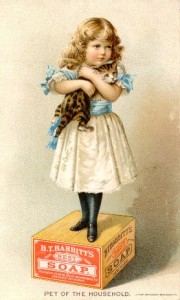 vintage print of little girl on soap box with kitten